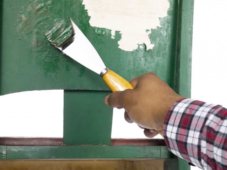 scraping an old paint