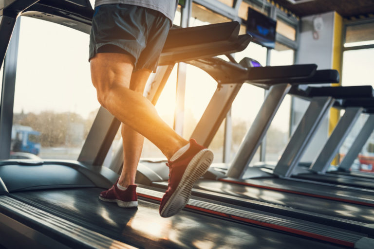 person running on treadmill