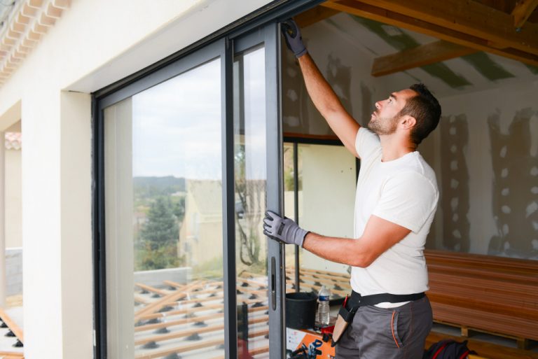 man building a house