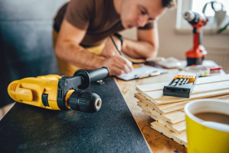 man doing home improvement
